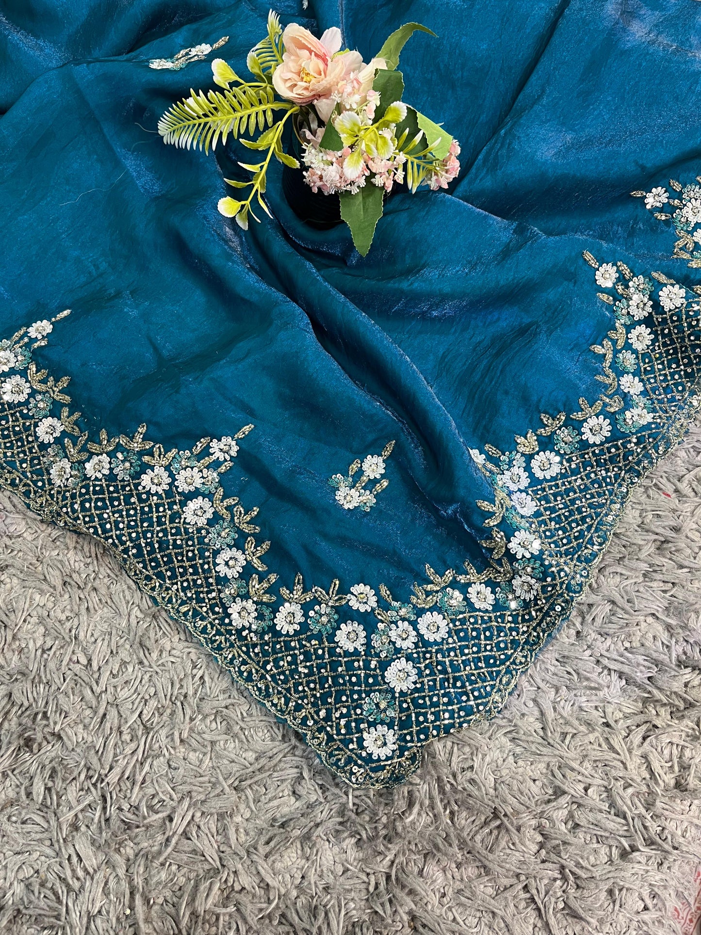 Exclusive Fendy Satin Saree with Hand-worked Triangle Motif