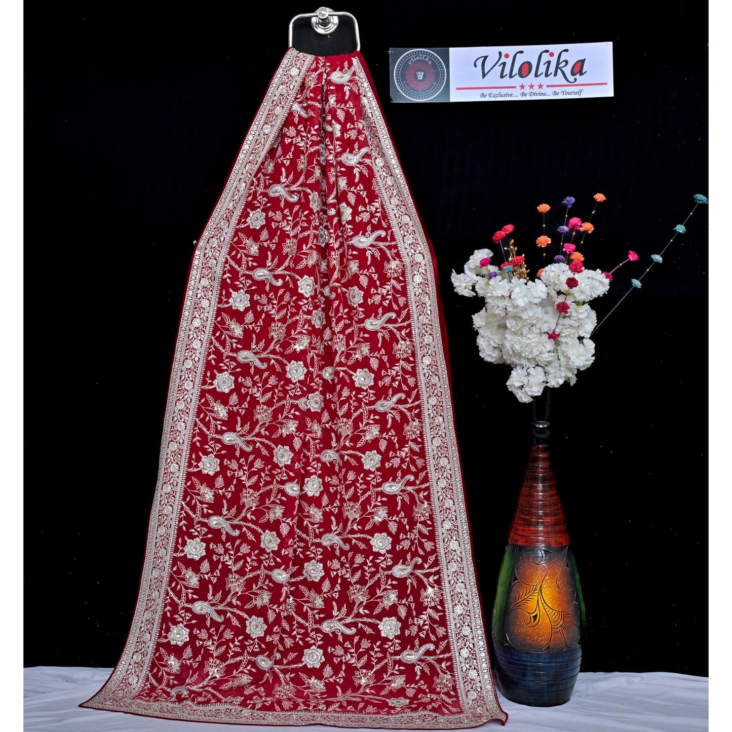 Exclusive Designer Georgette saree with beautiful embroidery work and crafted with metallic sequin and stones