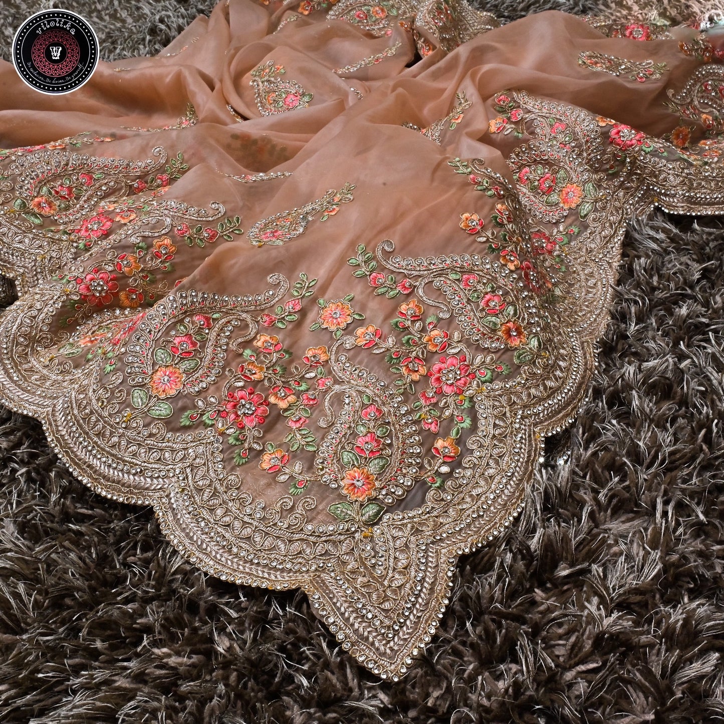 Exclusive Designer Organza sarees with allover jari and thread work and crafted with stones