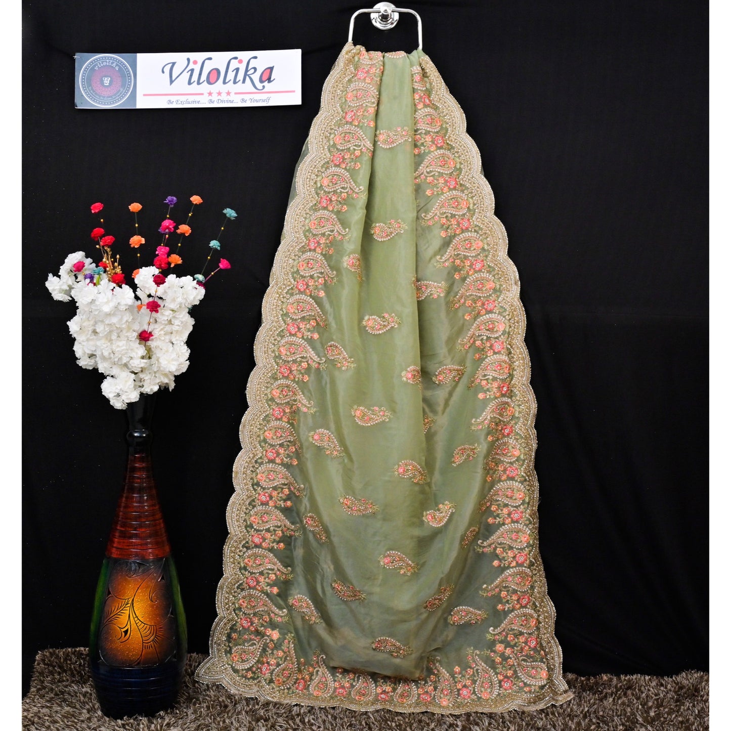 Exclusive Designer Organza sarees with allover jari and thread work and crafted with stones