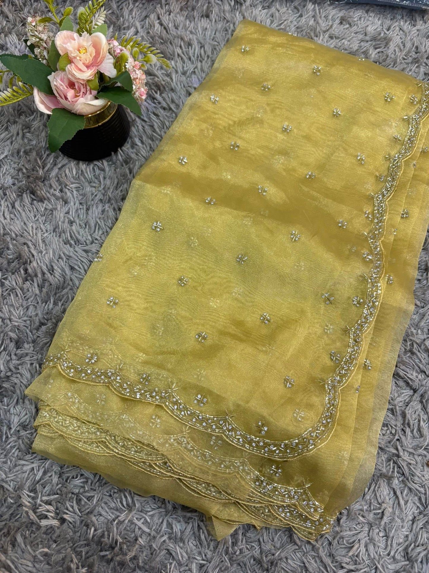 Handworked tissue organza sarees with allover floral butta