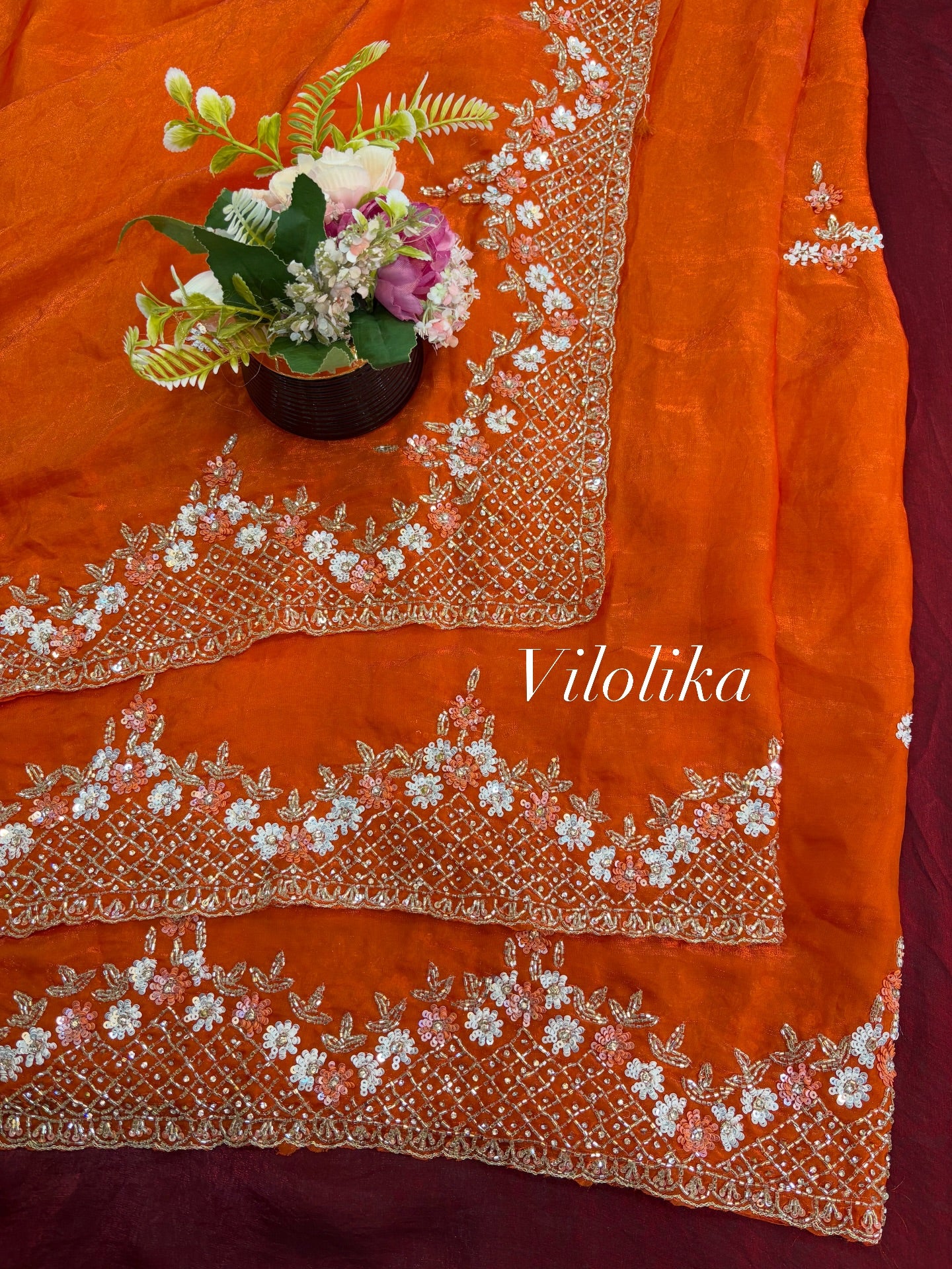 Exclusive Fendy Satin Saree with Hand-worked Triangle Motif