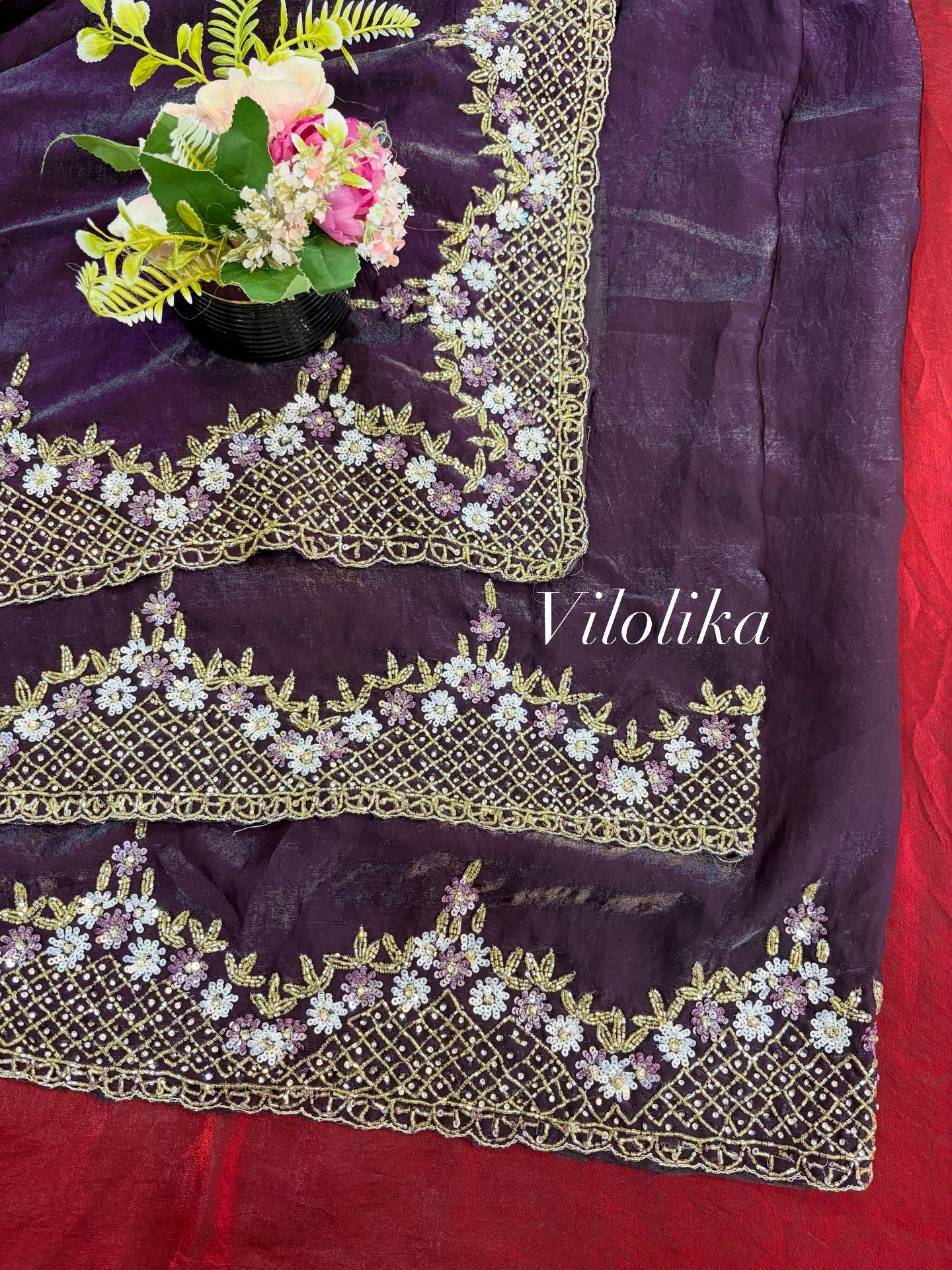 Exclusive Fendy Satin Saree with Hand-worked Triangle Motif