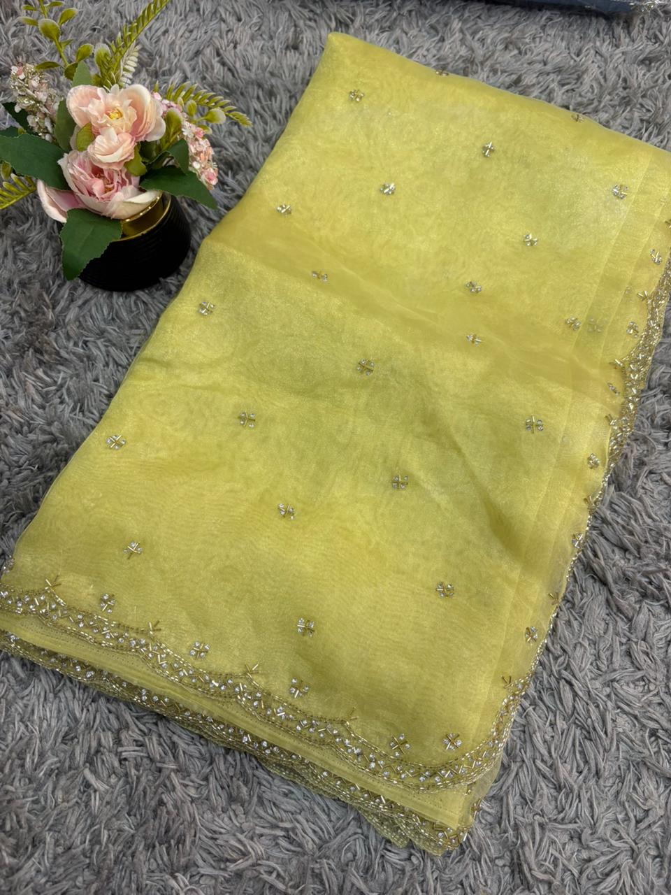Handworked tissue organza sarees with allover floral butta