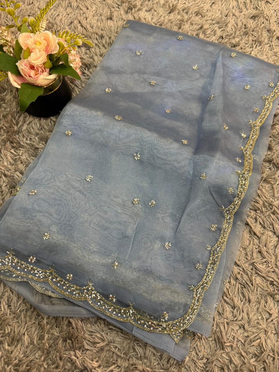 Handworked tissue organza sarees with allover floral butta