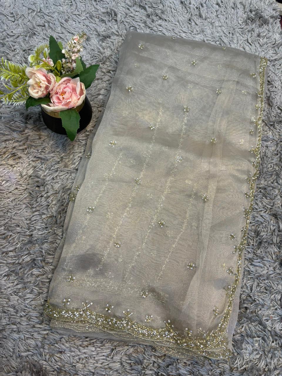 Handworked tissue organza sarees with allover floral butta