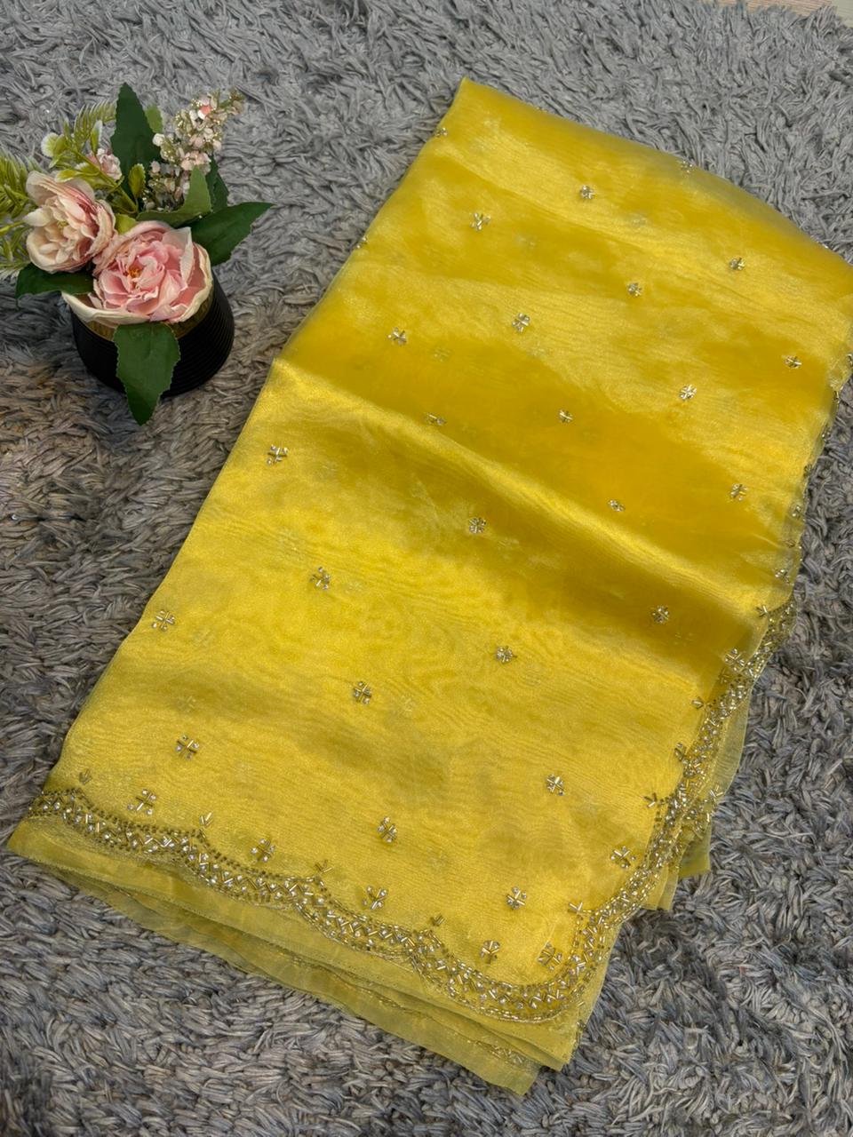 Handworked tissue organza sarees with allover floral butta