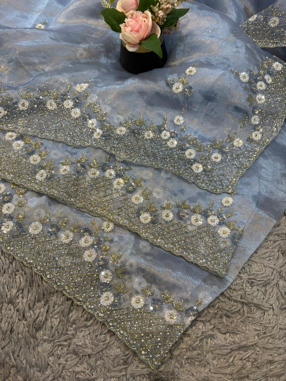 Handworked Tissue organza saree in triangle motif