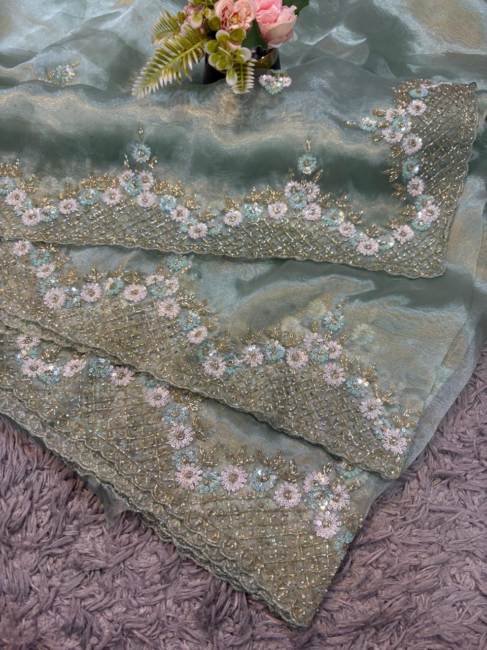 Handworked Tissue organza saree in triangle motif