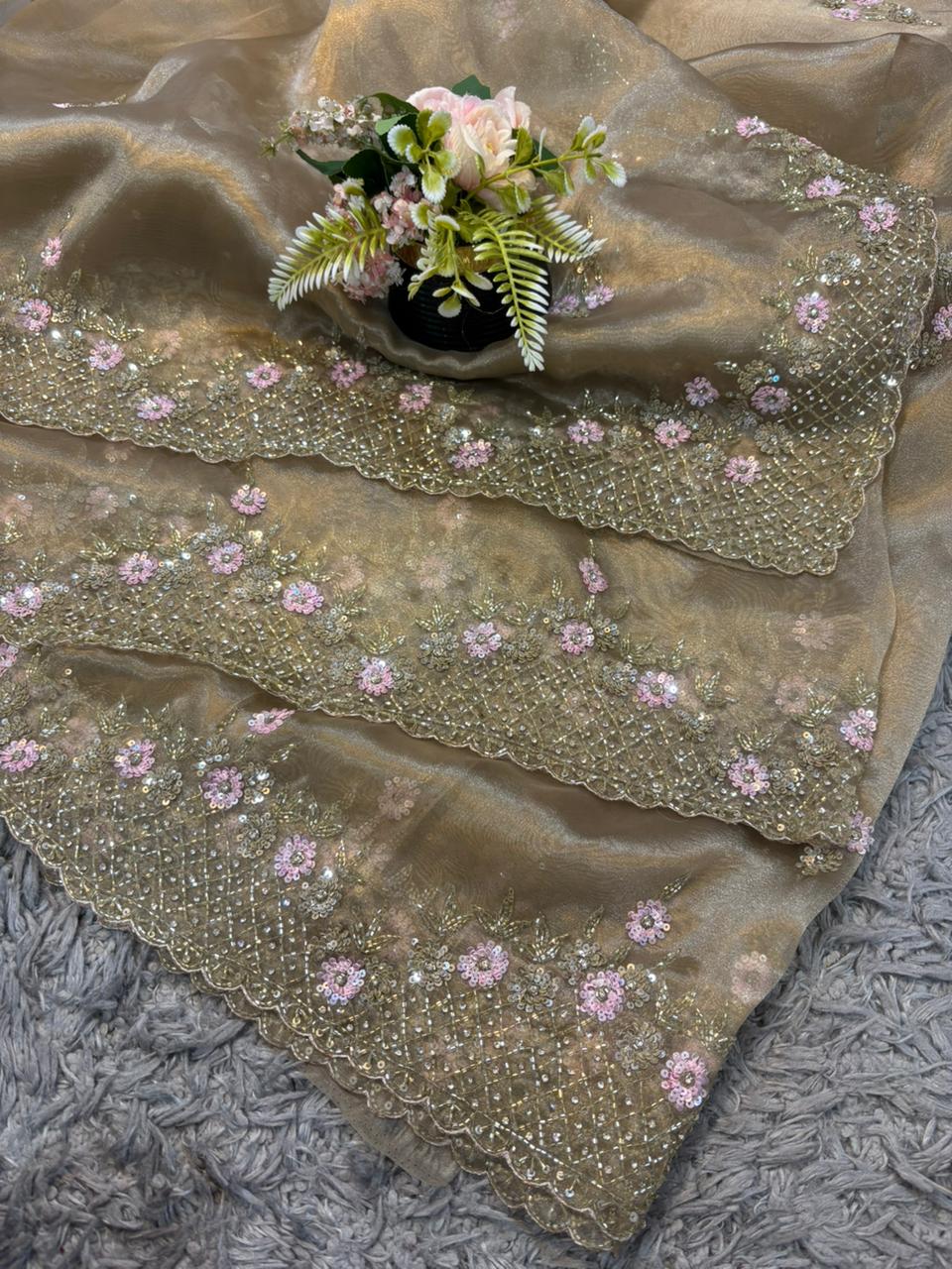 Handworked Tissue organza saree in triangle motif