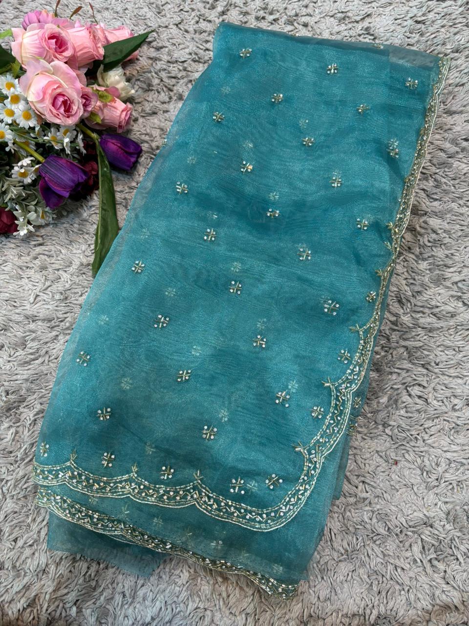 Handworked Tissue Organza sarees with allover Floral Butta