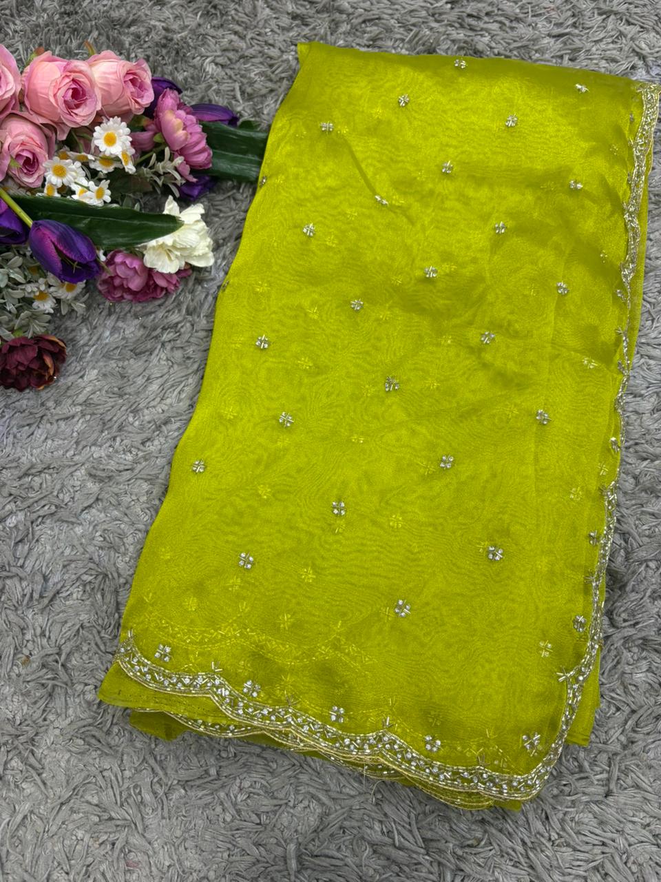 Handworked Tissue Organza sarees with allover Floral Butta