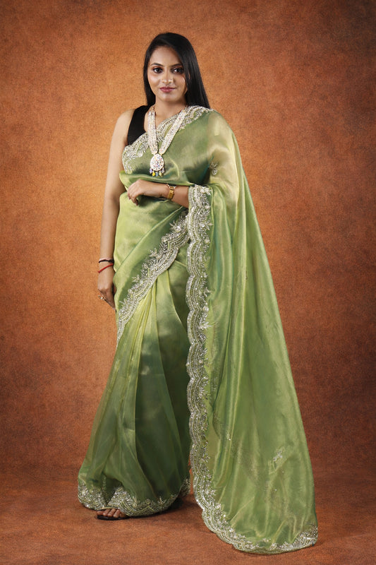 Renu Premium Metallic Tissue saree with heavy blouse piece