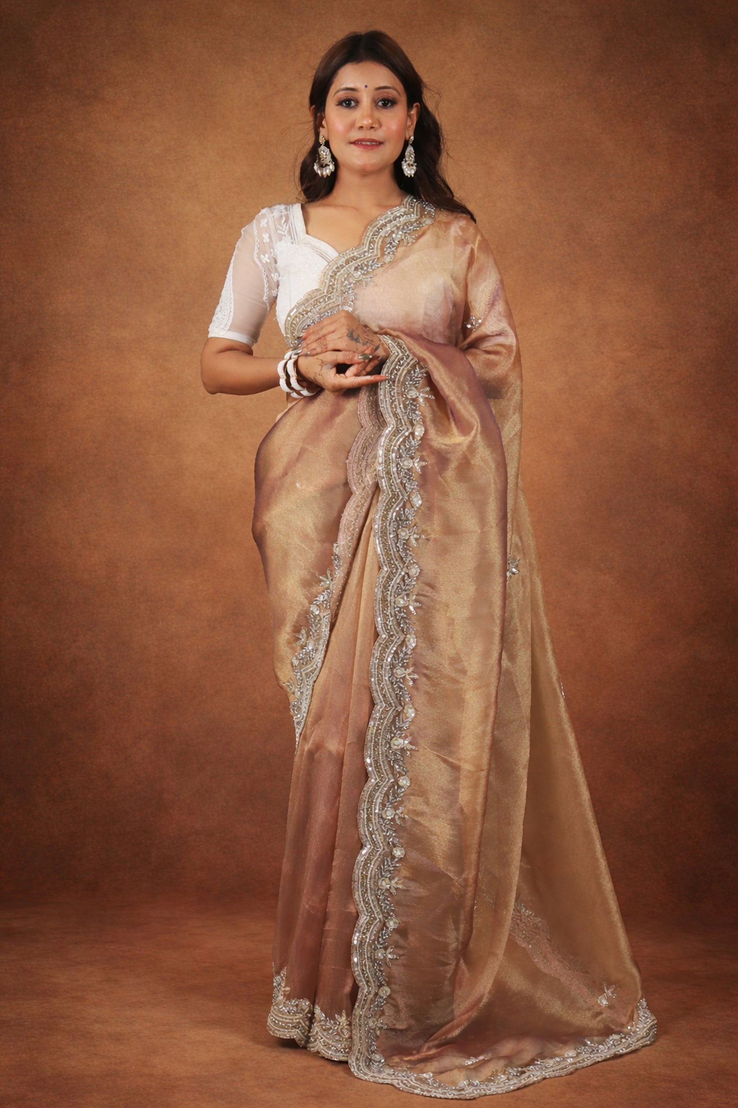Renu Premium Metallic Tissue saree with heavy blouse piece